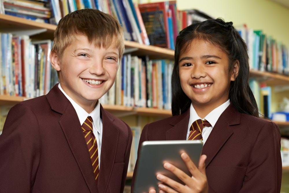 Smiling children in uniform